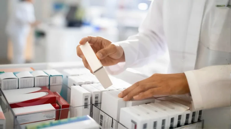 Pharmacist organizing medications